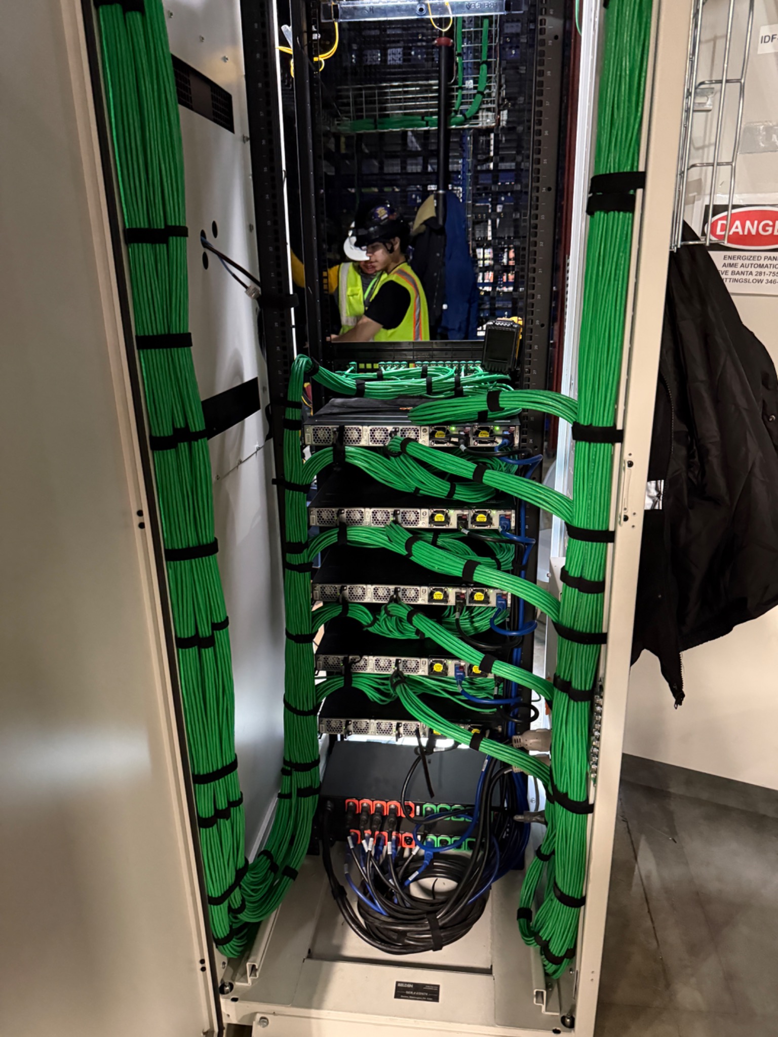 Commercial IDF network cabinet with organized structured cabling