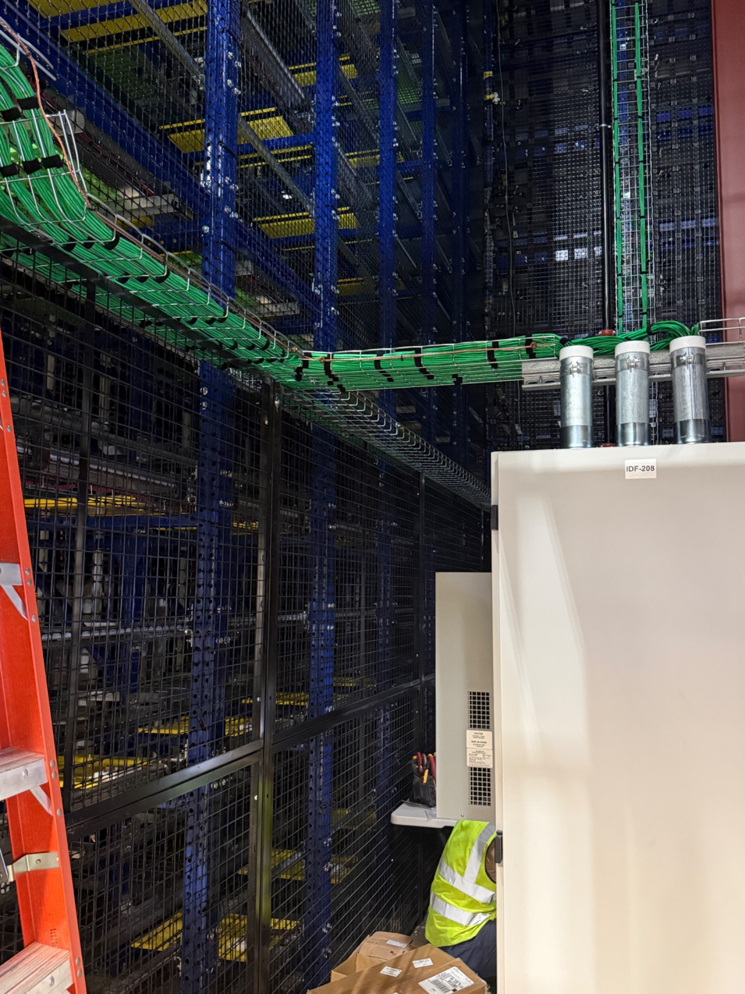 Commercial structured cabling routed through overhead cable tray